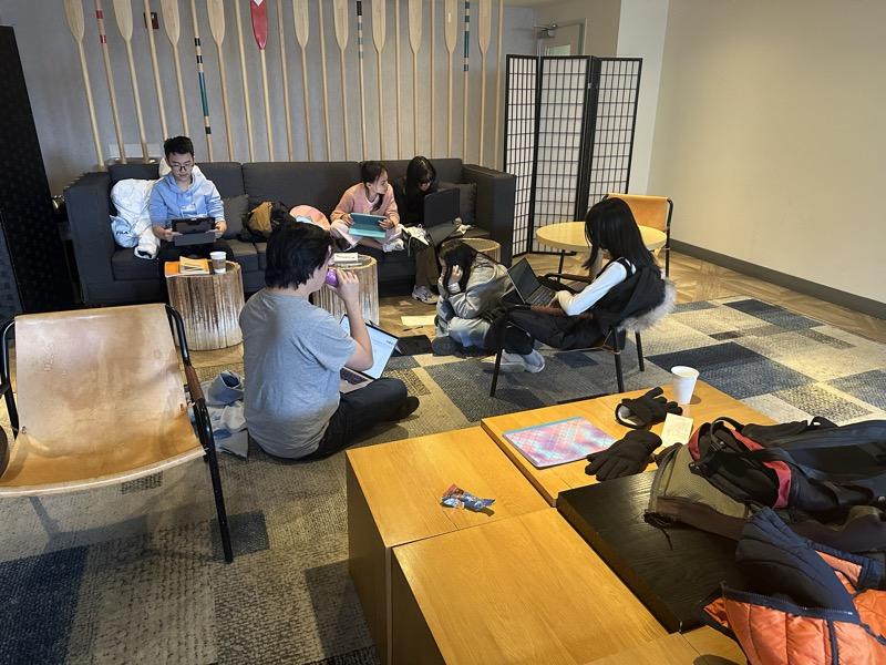A coach working one-on-one with a student on a live video call